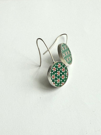 Tuka round Sterling silver Earrings